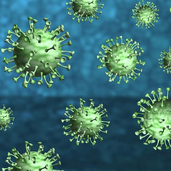 صورة توضيحية ثلاثية الأبعاد لفيروسات خضراء الشكل تنتشر في وسط مائي